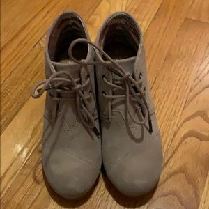 Tom’s wedge booties.